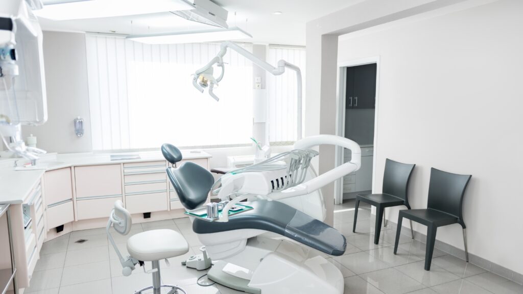Patient consulting with a dentist at Stunning Smile Clinic, ensuring a productive dentist appointment in Ealing for optimal oral health.
