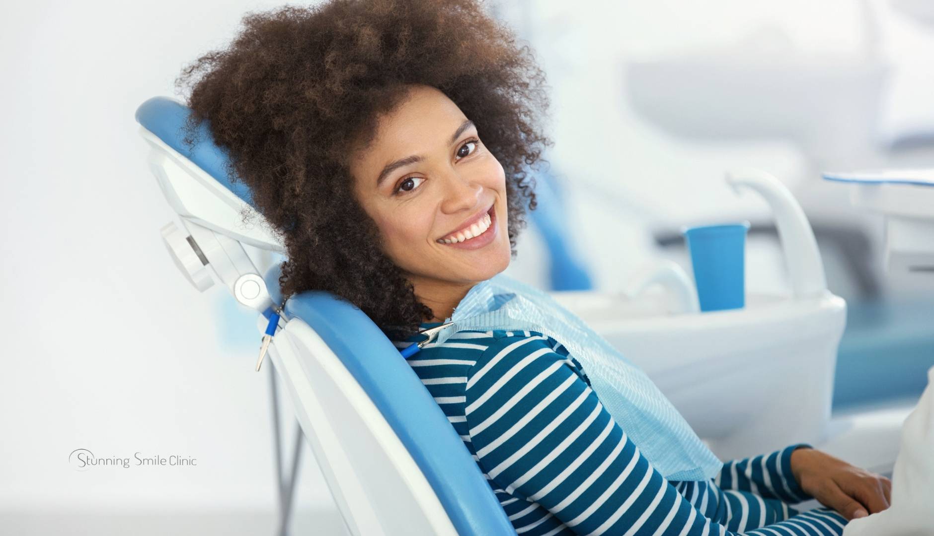 Illustration of gum disease in Ealing with a dentist examining a patient's gums.