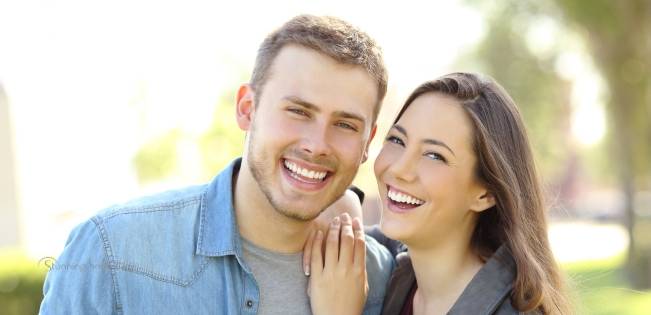 Patient discussing dental implants in Ealing with their dentist during a consultation.