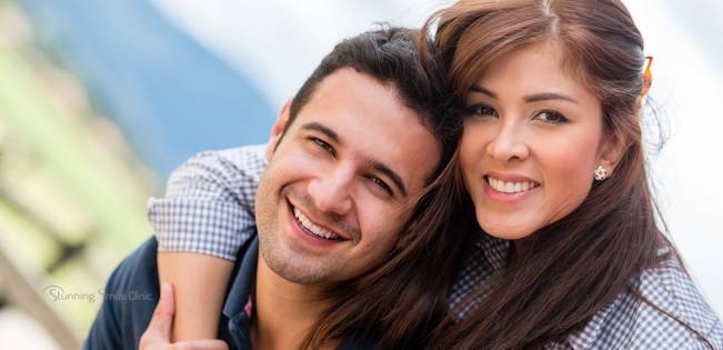 Patient discussing dental implants in Ealing with their dentist during a consultation.