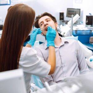 Dentist applying dental fillings in Ealing for cavity repair 